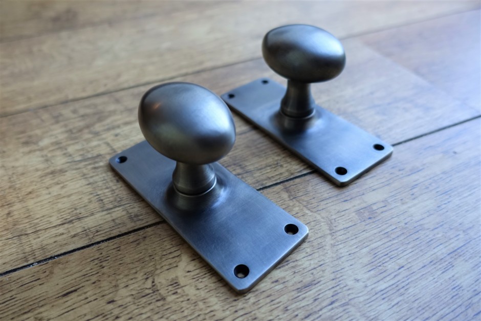 Victorian Oval Door Knobs on Schoolboard Backplate
