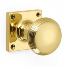 Reeded Cushion Door Knob on Square Rose